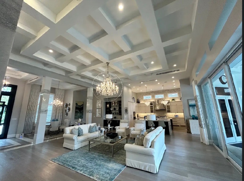 Luxury living room with coffered ceiling and chandelier — Richard Painting LLC
