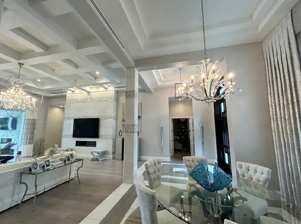 Dining and living area with chandeliers — Richard Painting LLC